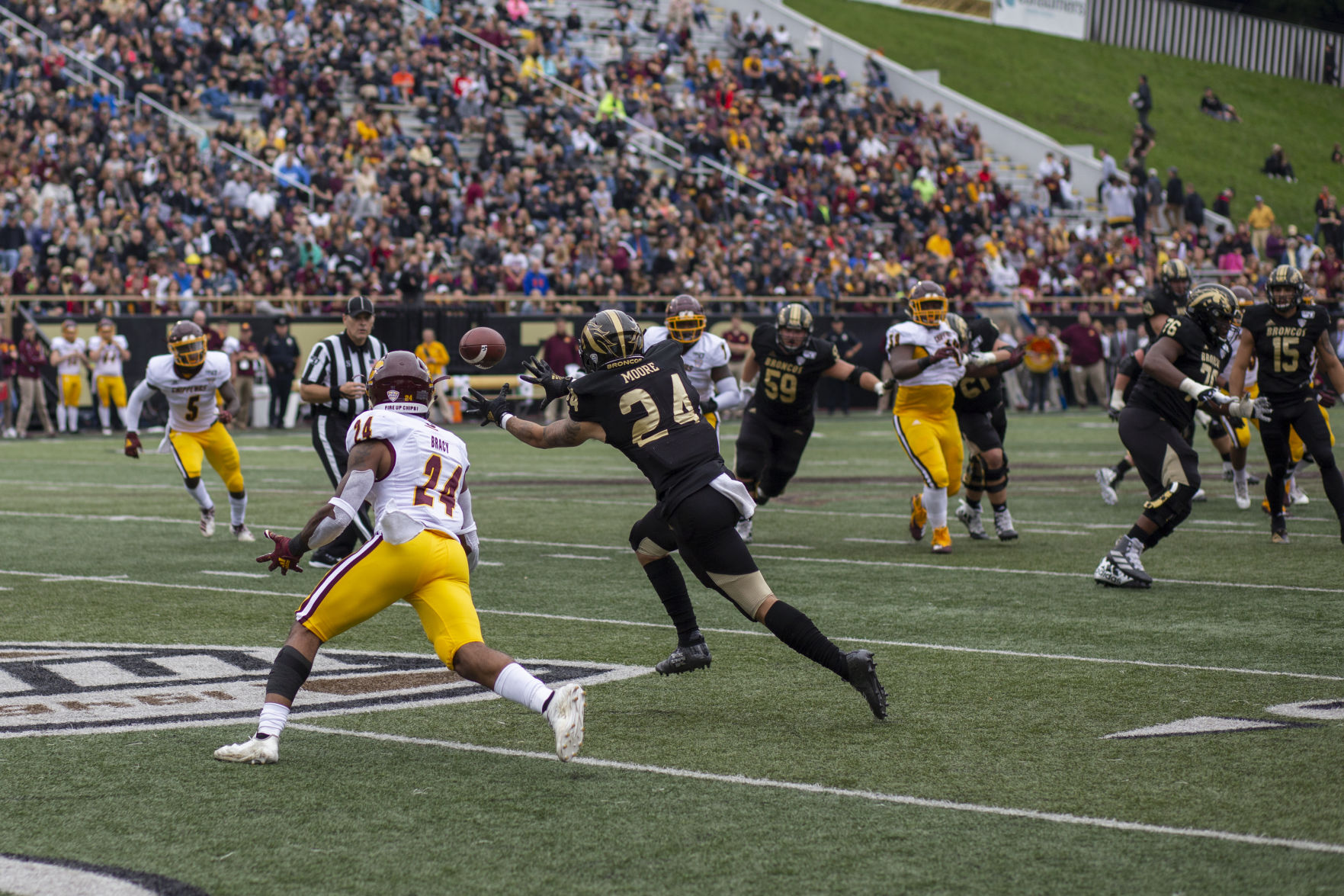 Wide receiver Sky Moore (24), stretches his arms out on a route to catch the football, at Waldo Stadium Saturday Sept. 28, 2019.